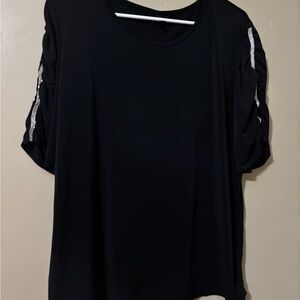 Elegant Black Long Sleeve Top with Silver Details